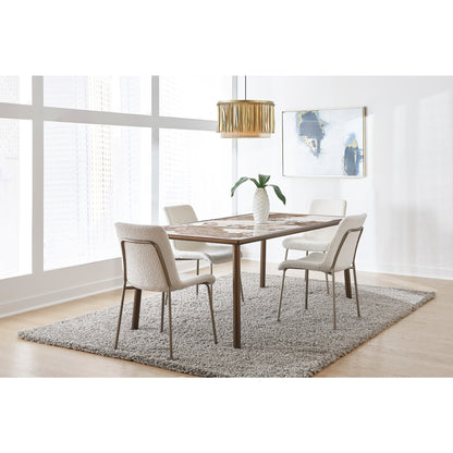 Tavolo da pranzo con piano in pietra Tulum e base in metallo bronzo